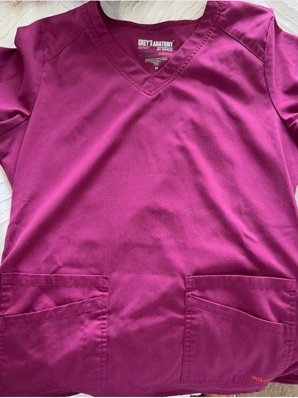 Grey's Anatomy Women’s  V-Neck Scrub Top in Berry